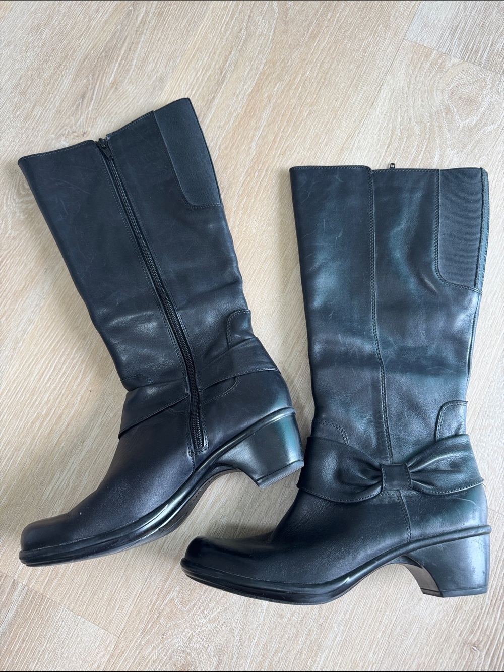 Clarks Black Leather Mid-Calf Boots with Bow Accent